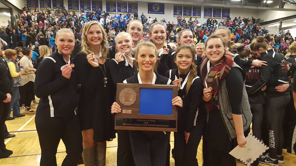 Dance team with medals