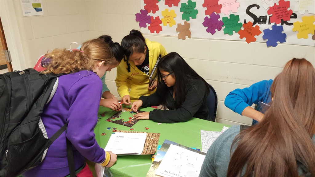 Students working on a puzzle