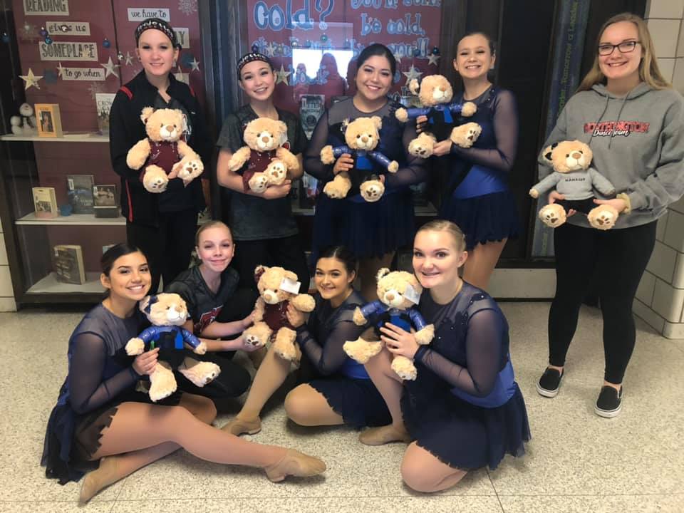 Trojette dancers with teddy bears