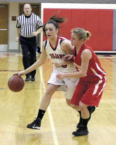 Ana Boever dribbles down court