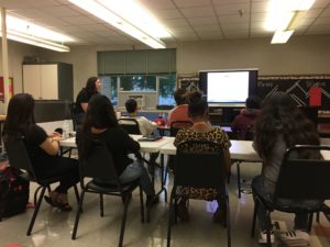 Abigail Wilking presenting to students about JBS history and job opportunities. 