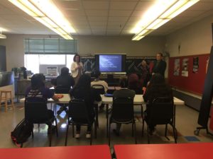 Laurie Maras and Mark Vis from First State Bank Southwest giving a presentation to students.