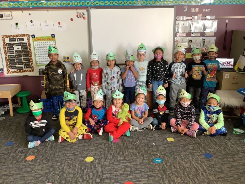 Students with Grinch hats