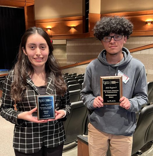 Students holding awards