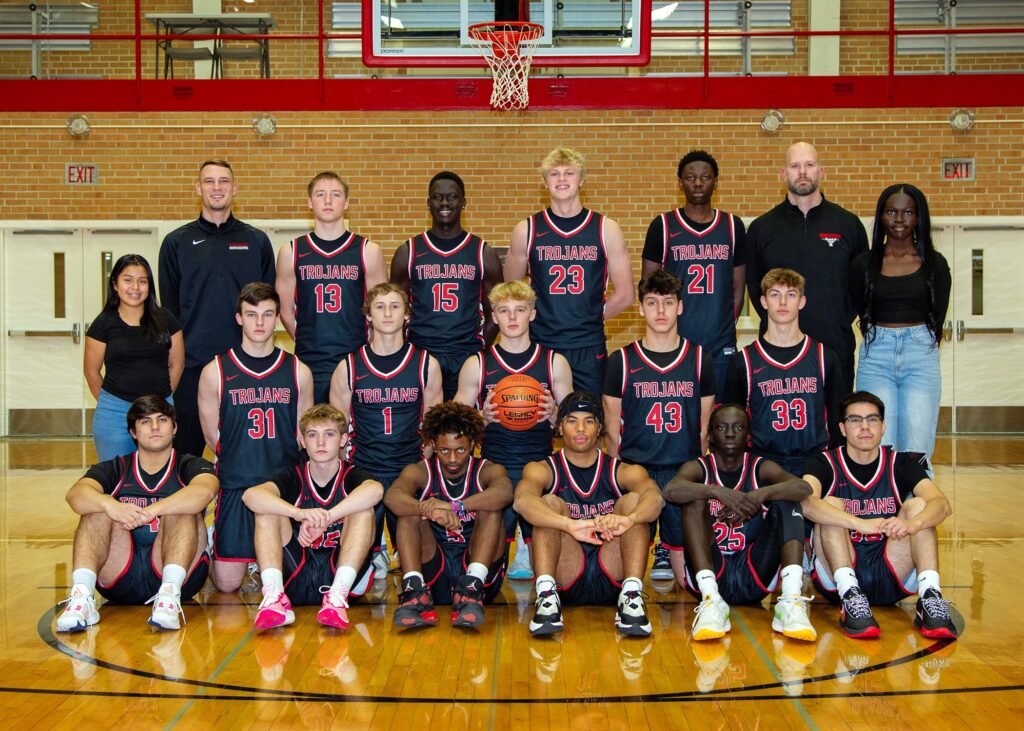 15 student basketball players, 2 coaches and 2 team managers