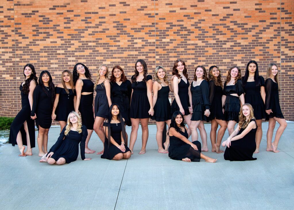 18 female students all dressed in black