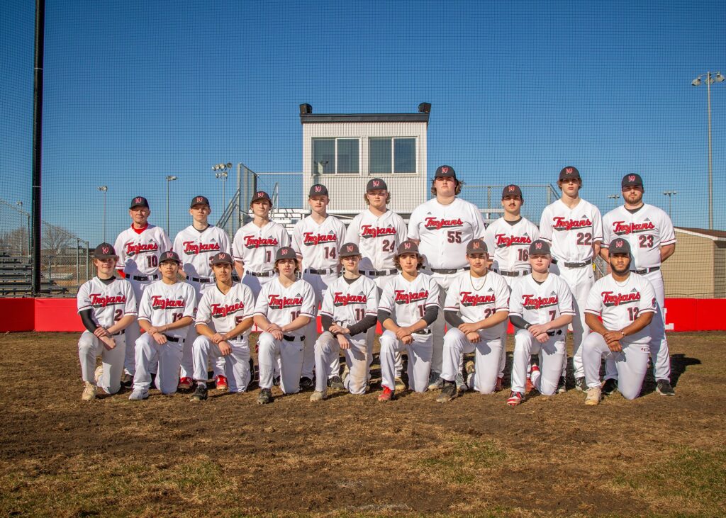 17 members of the Trojan baseball team with 2 coaches