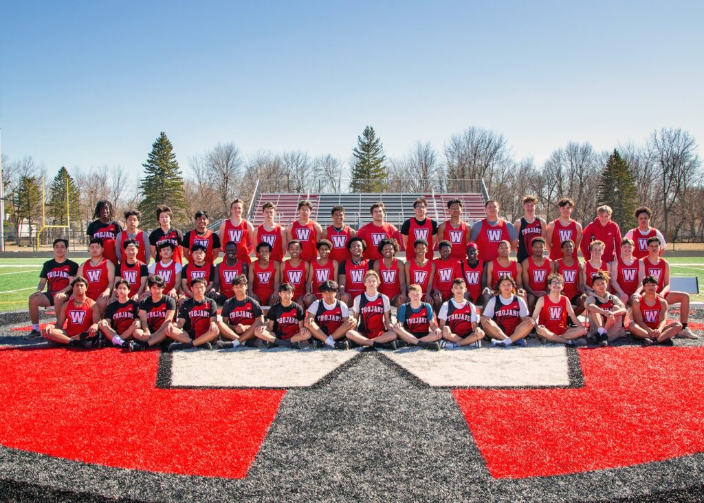 Boys Track team on the field in 3 rows