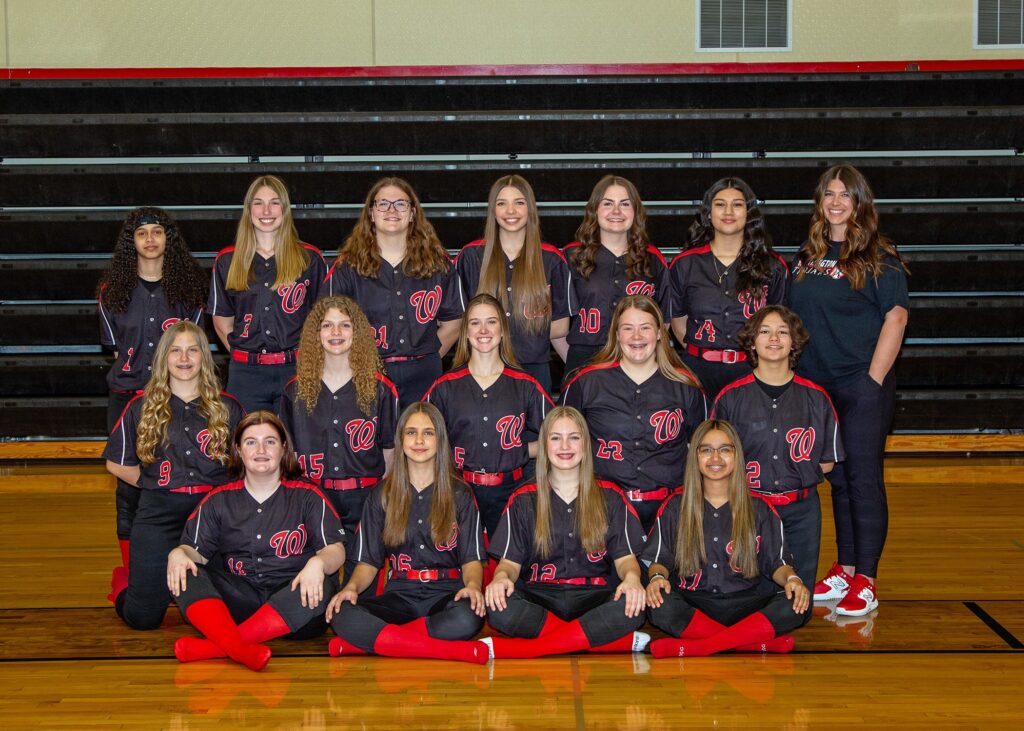 15 softball players with the coach