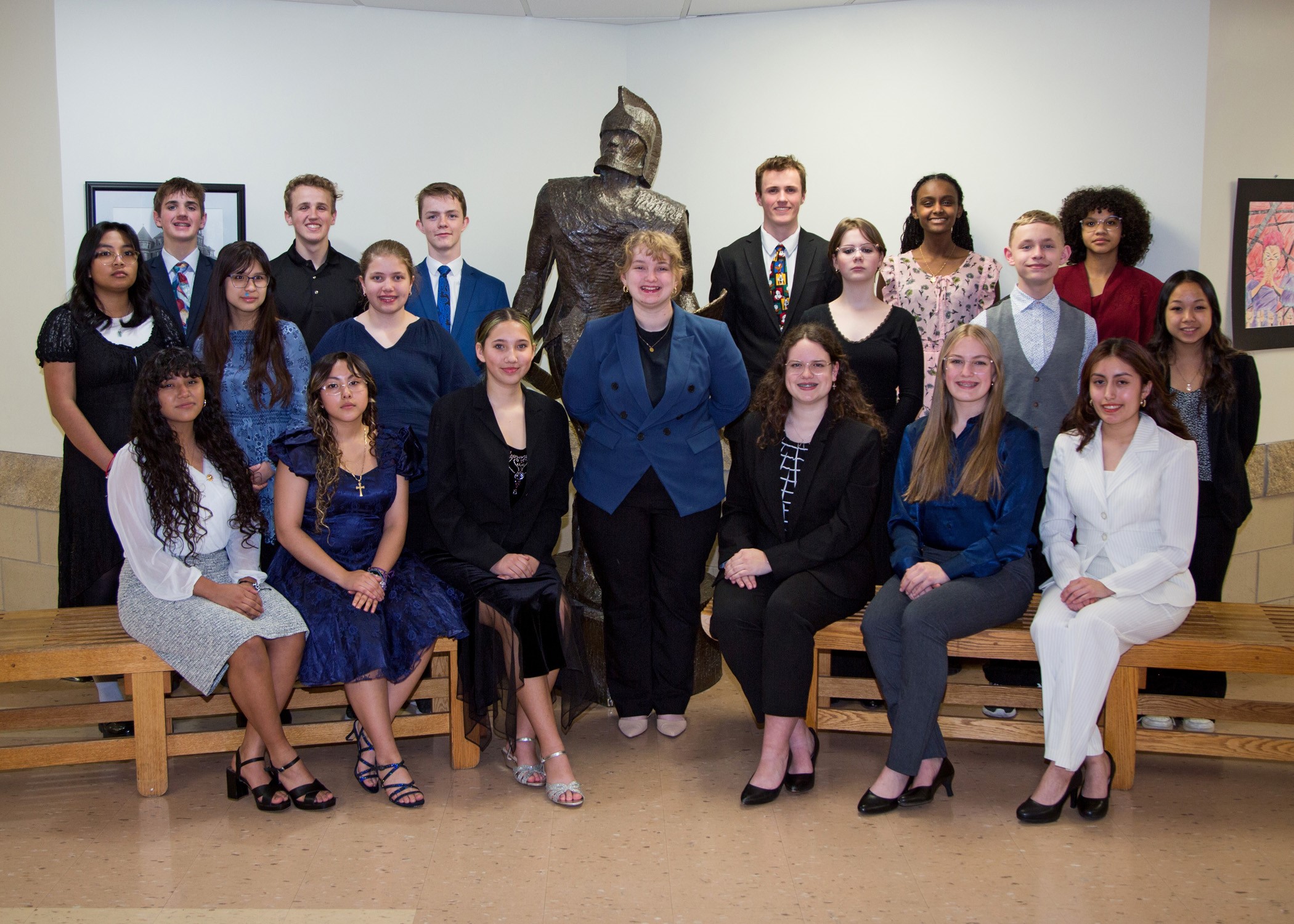 Trojan Speech team in 3 rows by the Trojan Statue