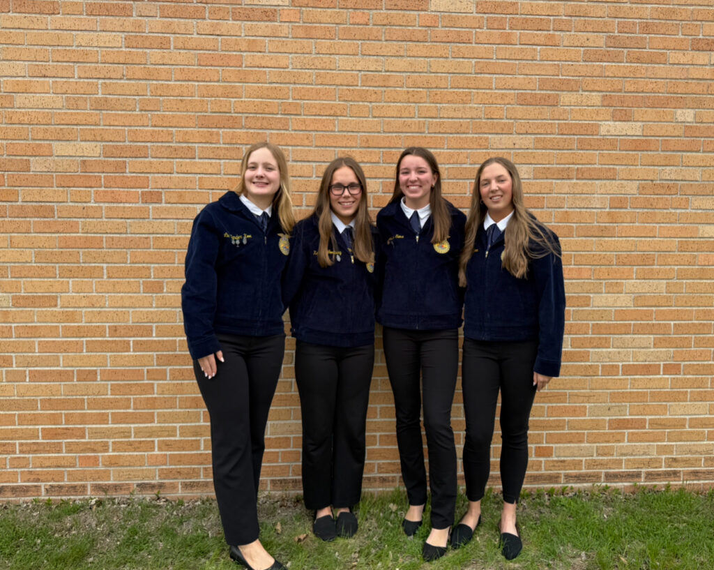 4 students in FFA jackets