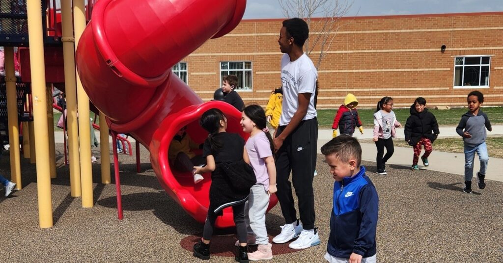 Student playing on the playground