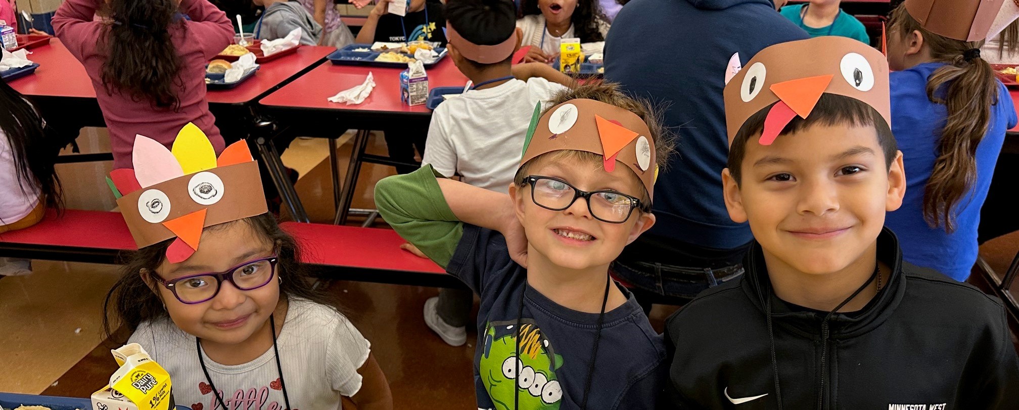 Elementary student with turkey headbands