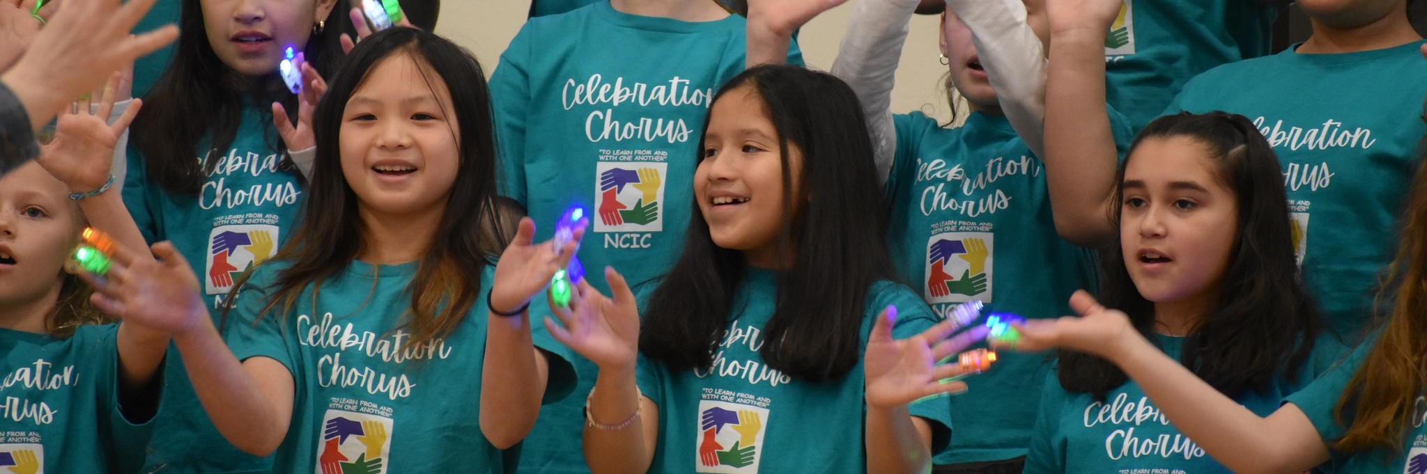 3 students singing