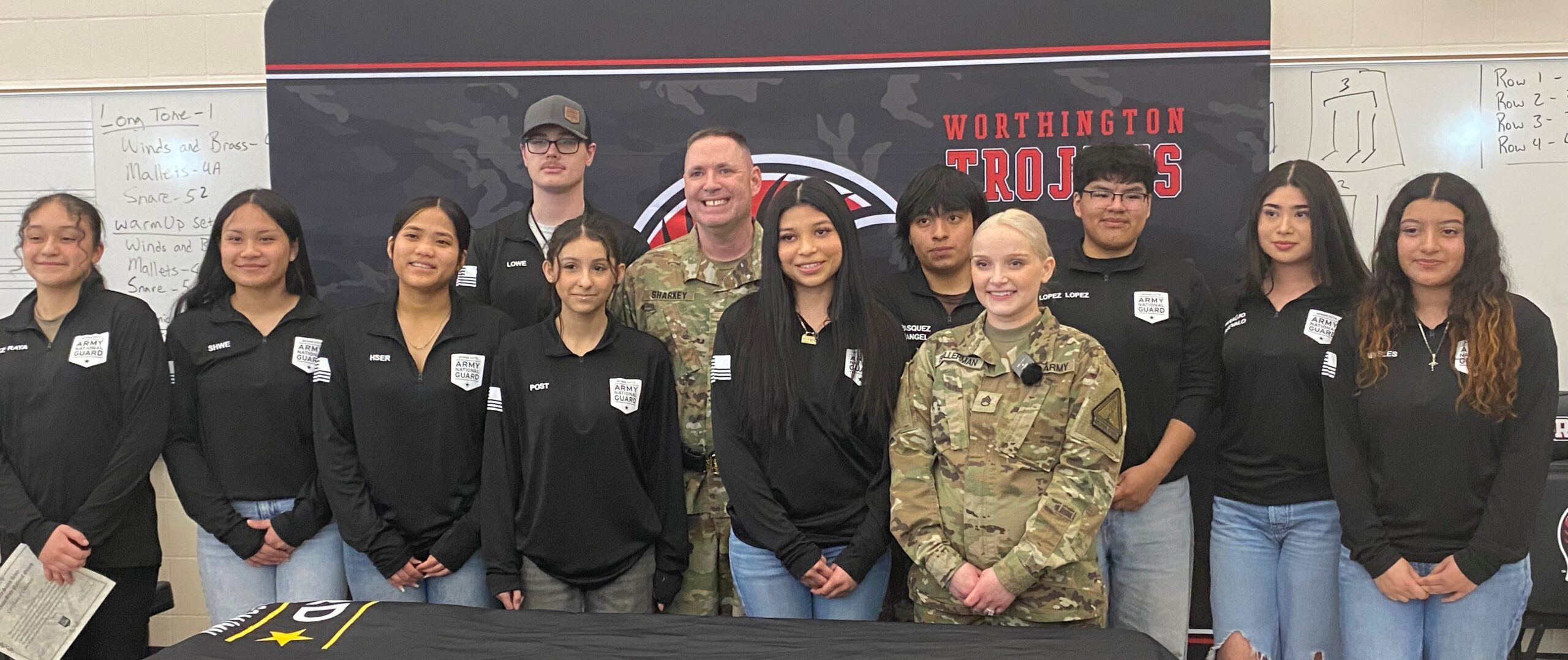 Ten students with two National Guard personnel
