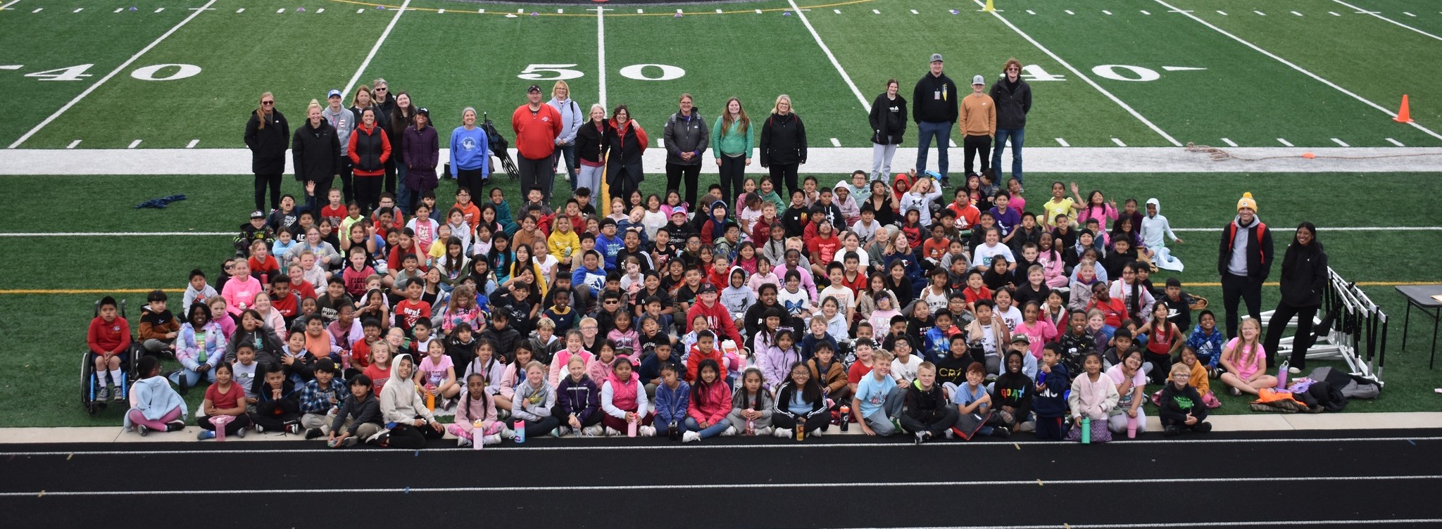 Group of elementary students at the track