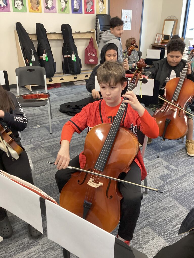 Student playing cello